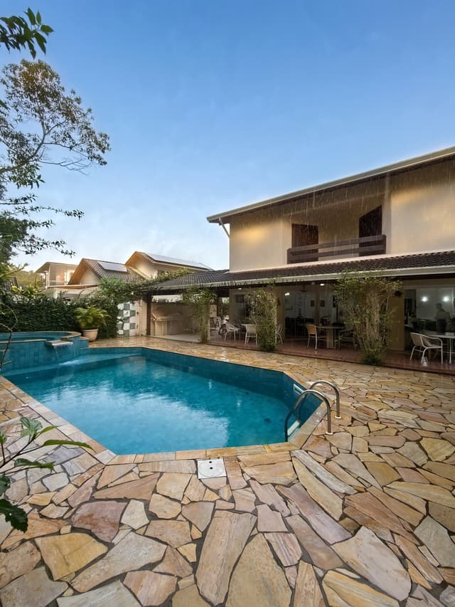 Casa com 4 suítes e piscina na Riviera, Módulo 18
